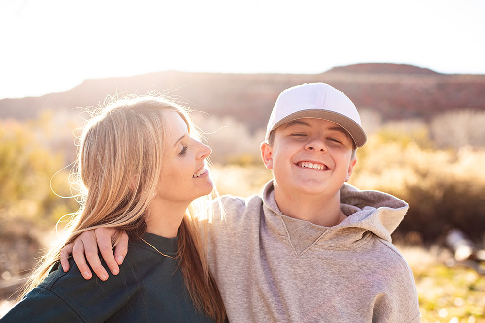 Mother being playful with her teenage son